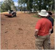 observing land clearing by Coneteks Subsoil Mulcher observing land clearing by Coneteks Subsoil Mulcher